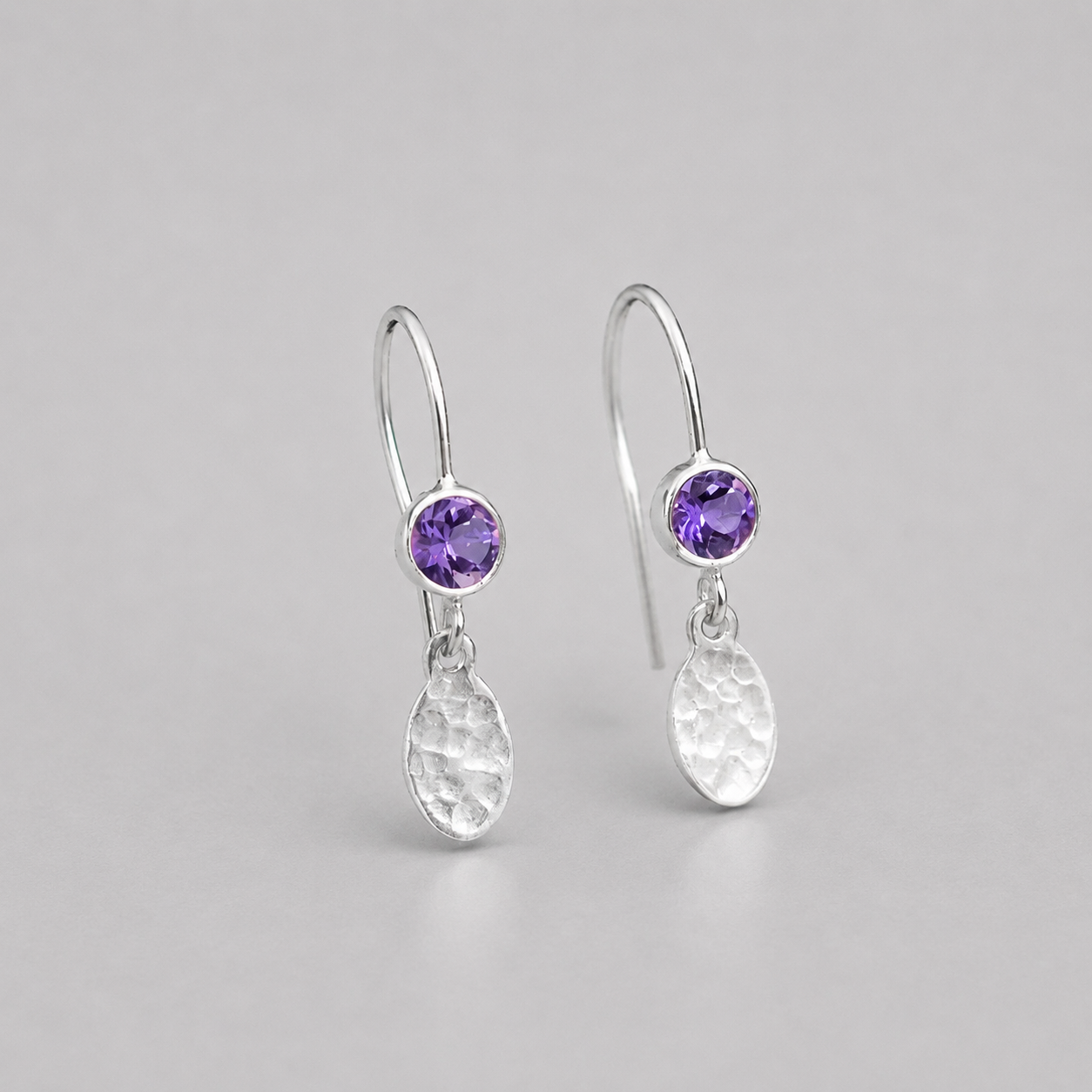 Amethyst February birthstone sterling silver earrings, hammered dangle ovals.