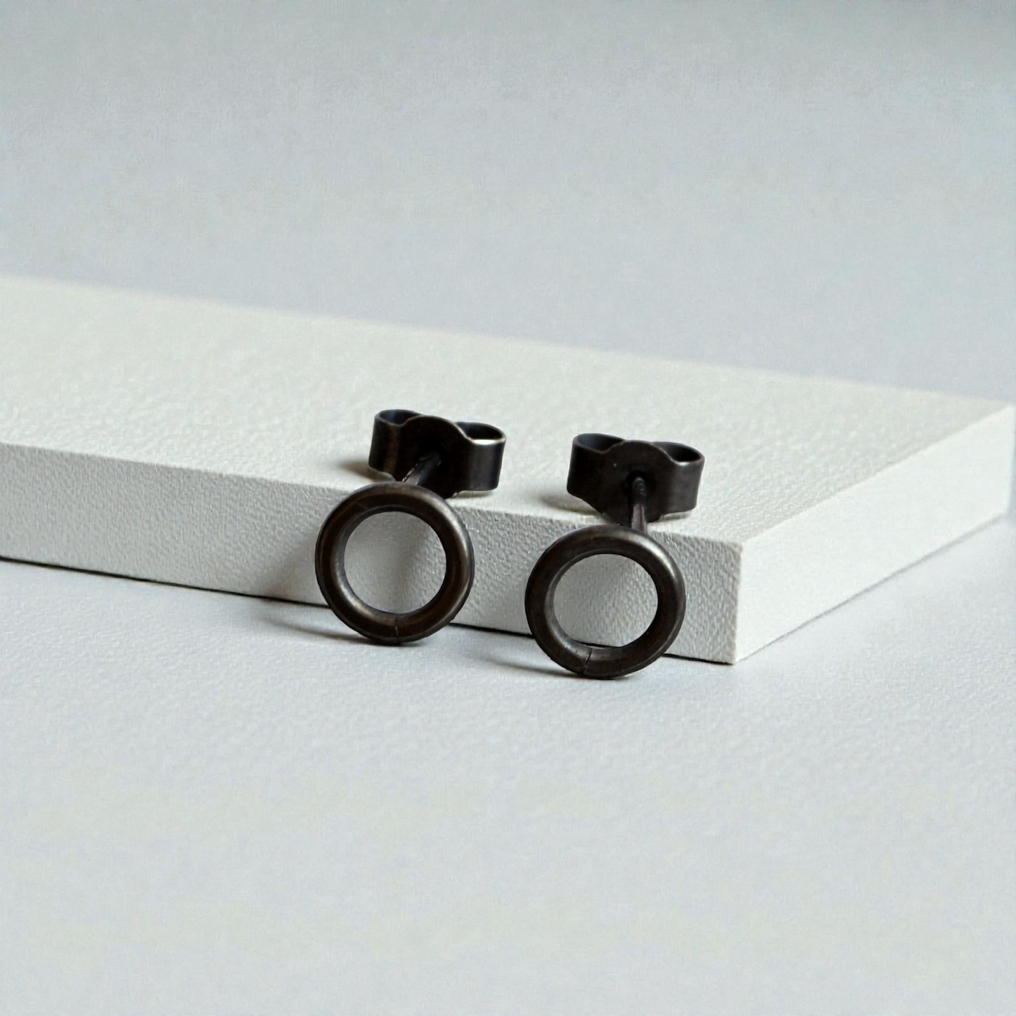 Oxidised sterling silver circle stud earrings.