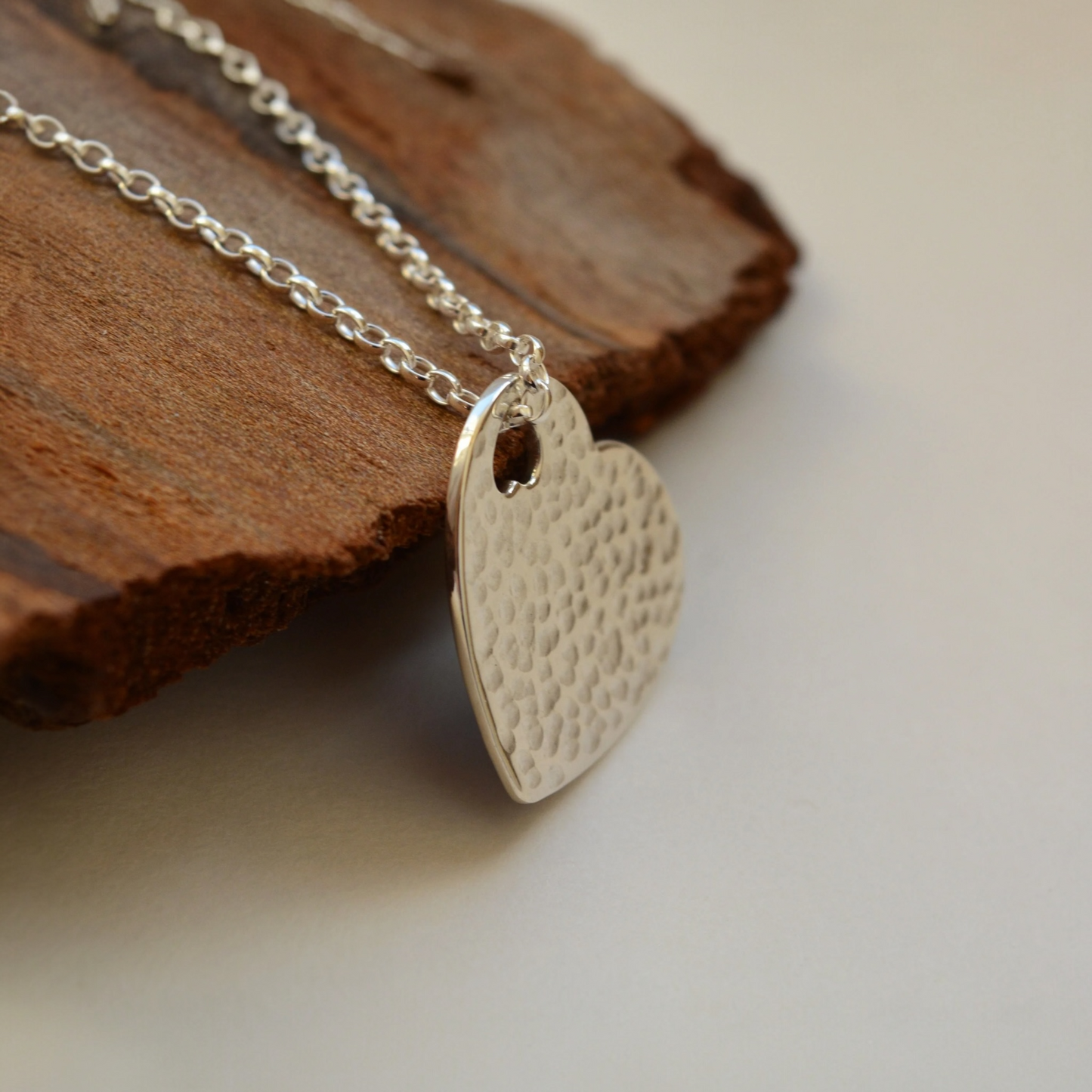 Hammered sterling silver heart necklace pendant.