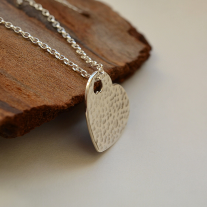 Hammered sterling silver heart necklace pendant.