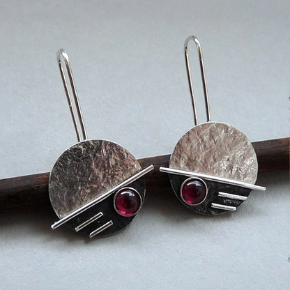 Sterling silver garnet earrings.
