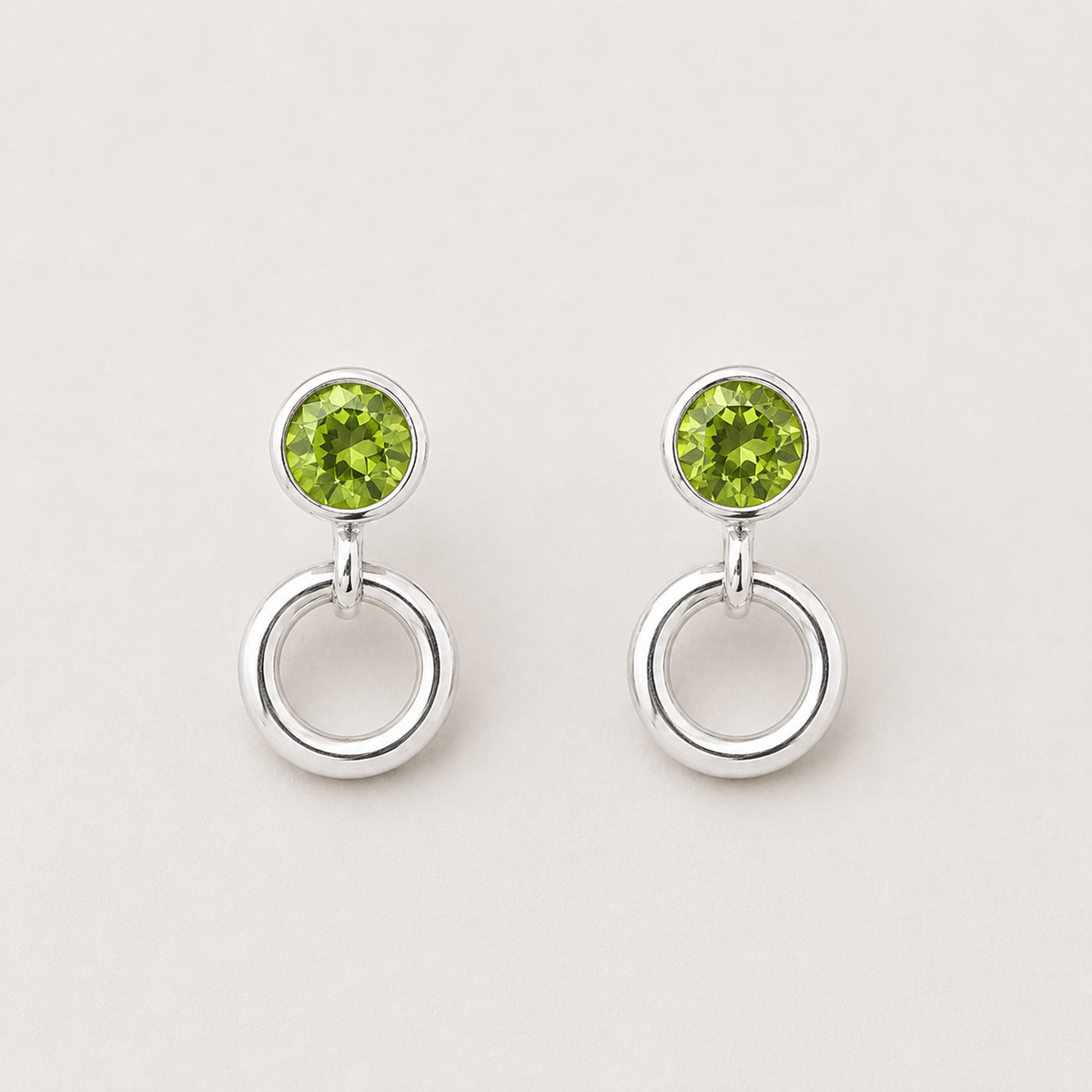 Peridot and circle sterling silver stud earrings.