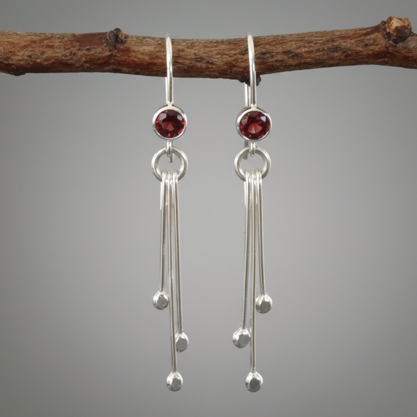 Garnet sterling silver dangle earrings.