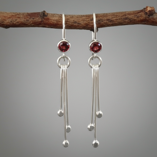 Garnet sterling silver dangle earrings.