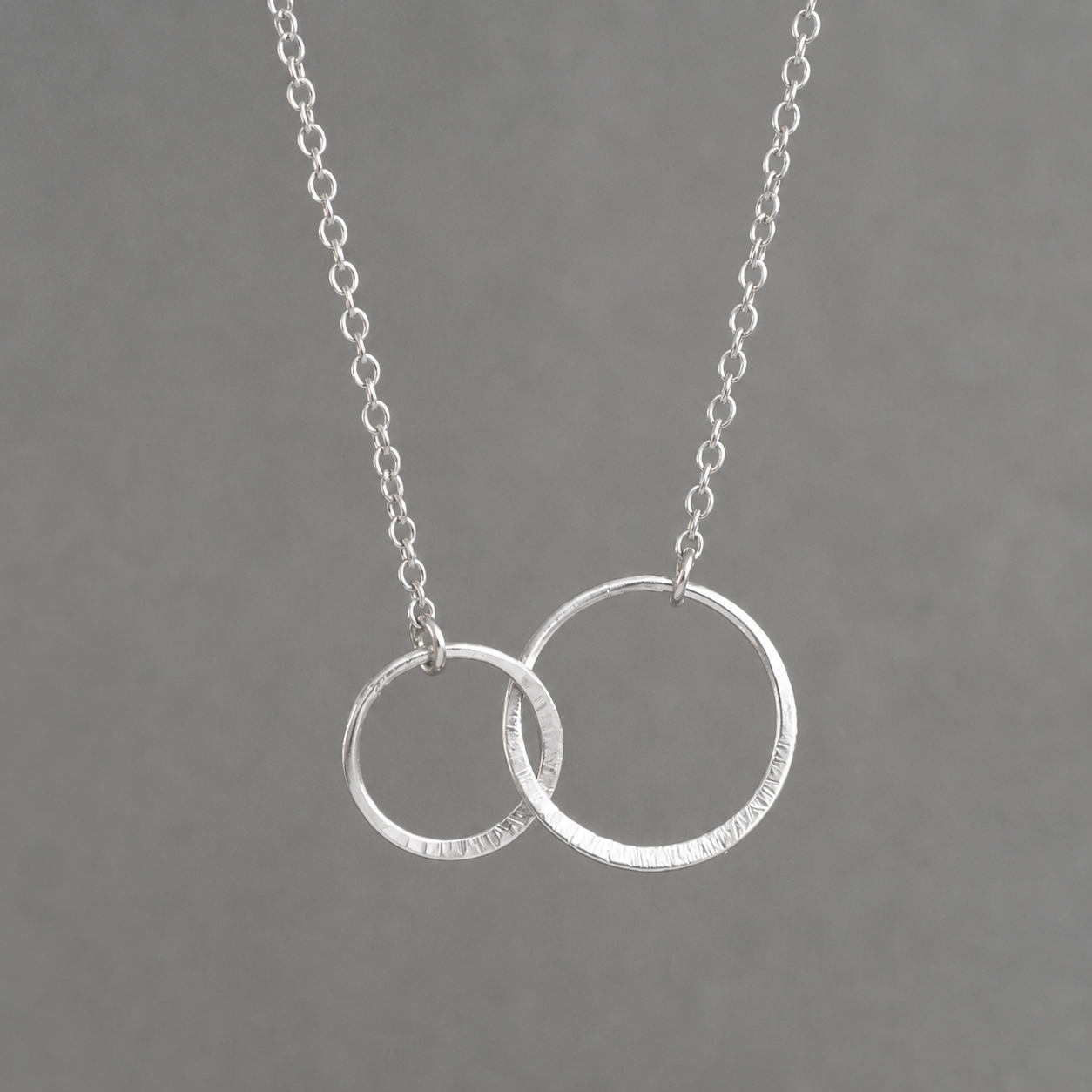 Sterling silver infinity necklace.