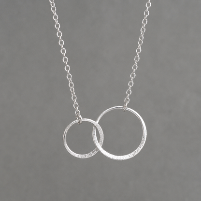 Sterling silver infinity necklace.