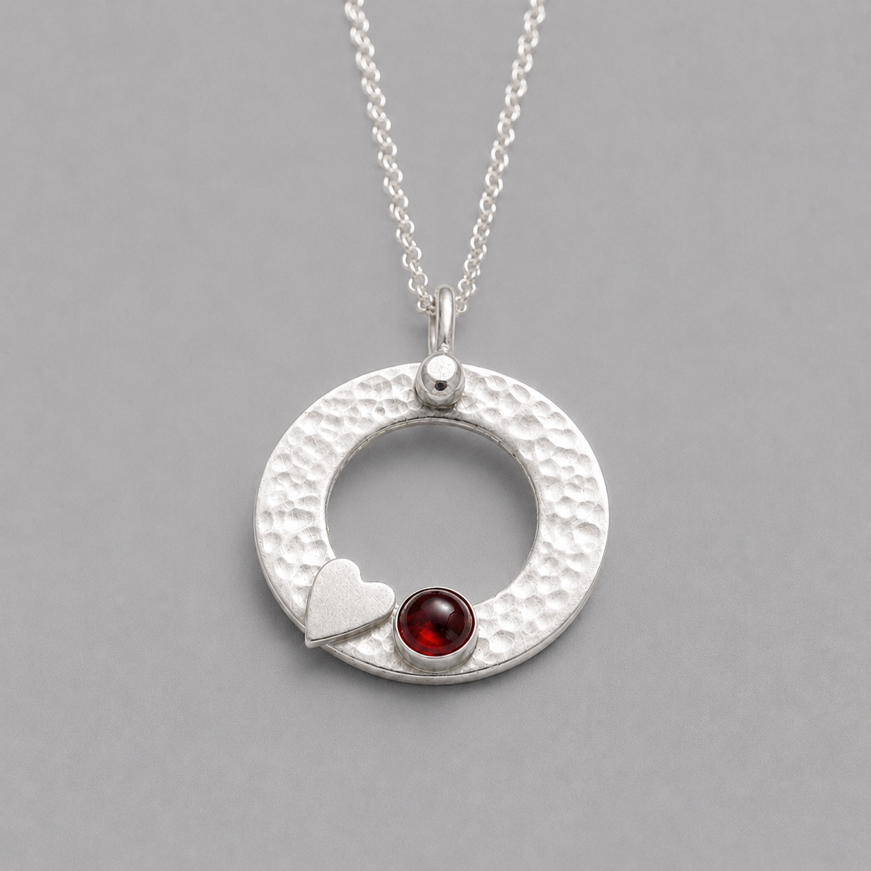 Sterling silver garnet circle necklace