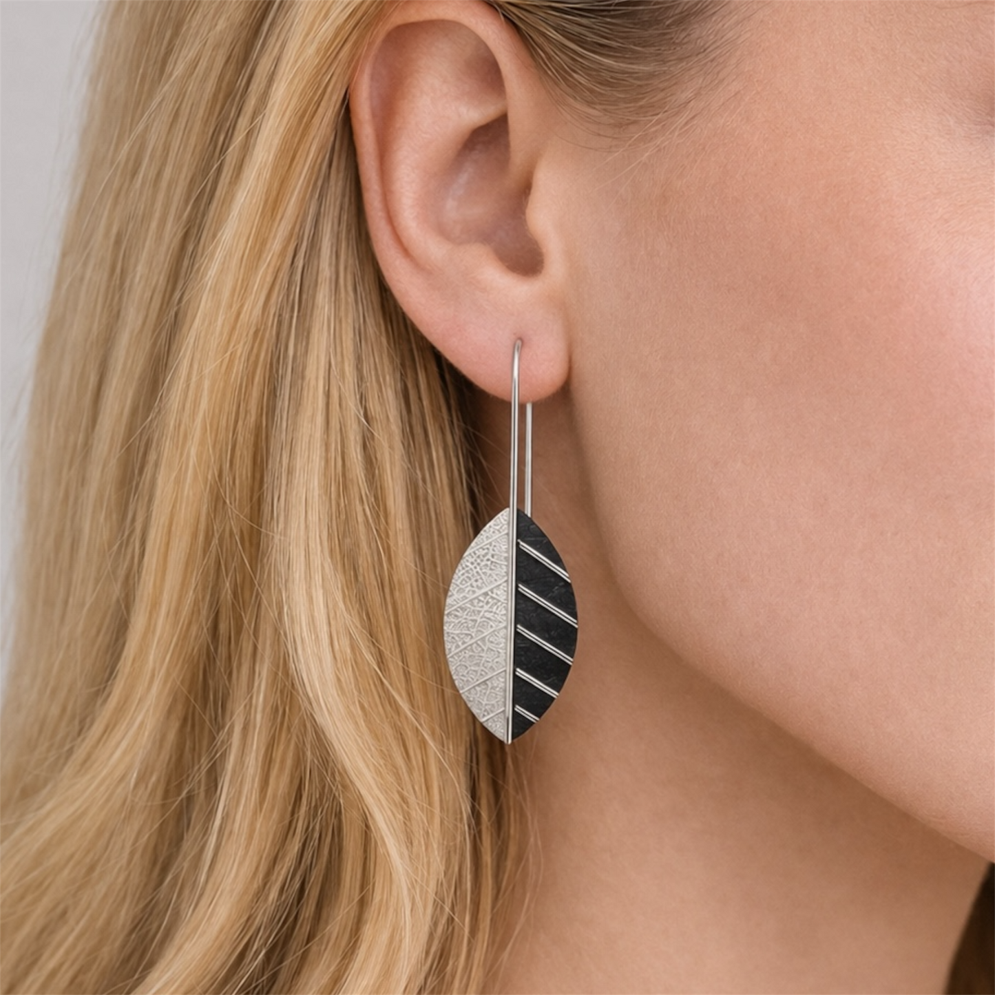 Sterling silver leaf earrings.