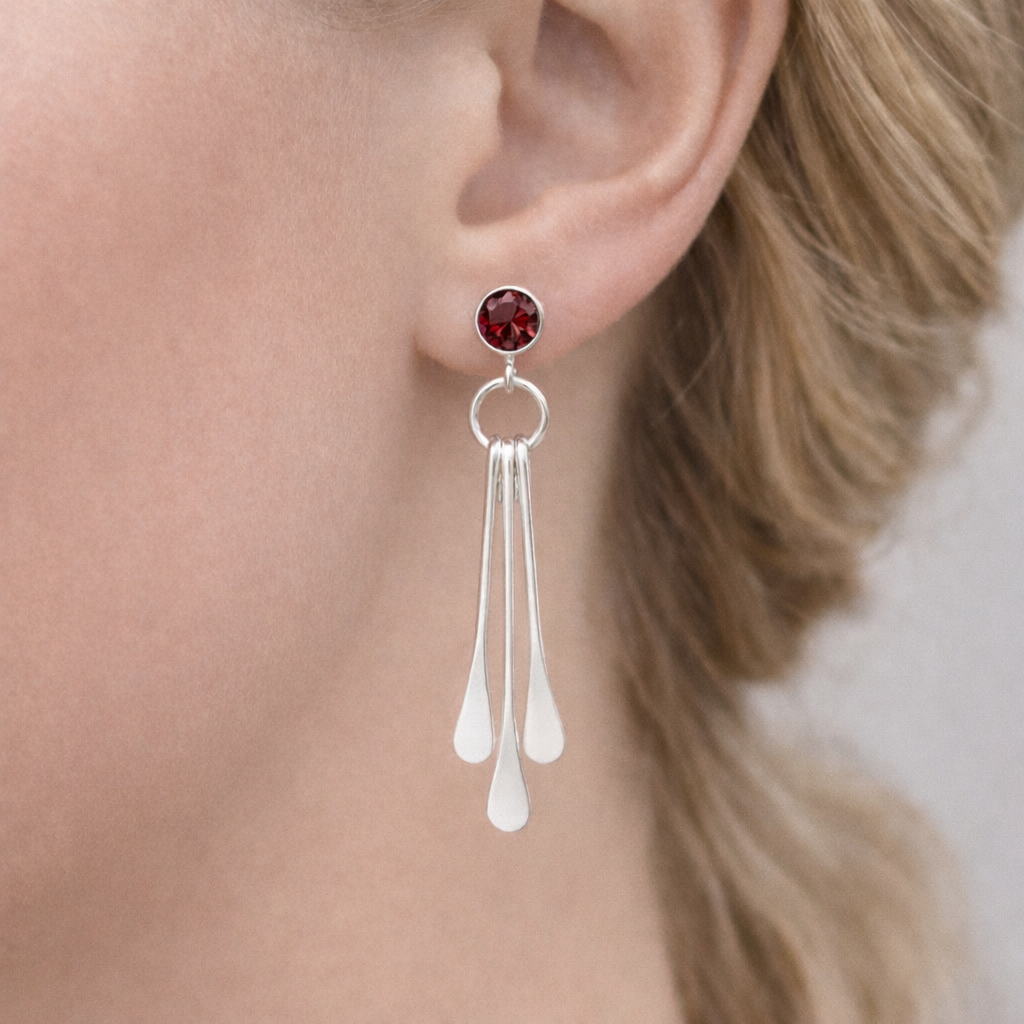 Garnet sterling silver dangle stud earrings.
