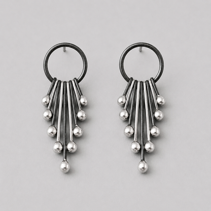 Handmade long sterling silver stud earrings.