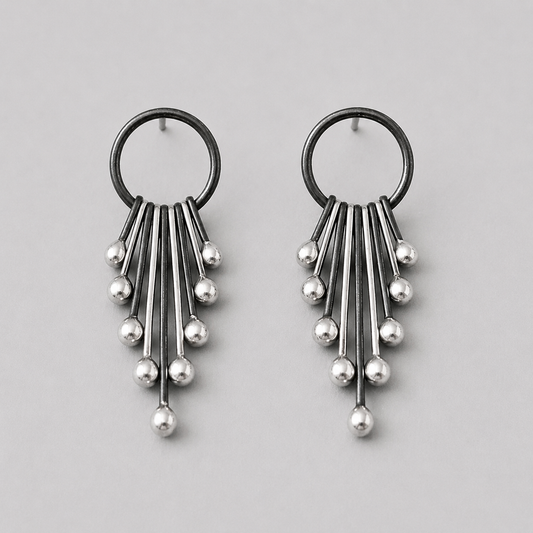 Handmade long sterling silver stud earrings.