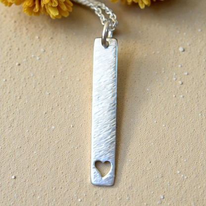 Hammered heart sterling silver rectangular necklace.