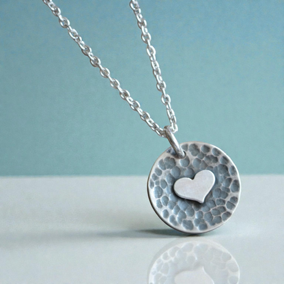 Sterling silver heart disc pendant
