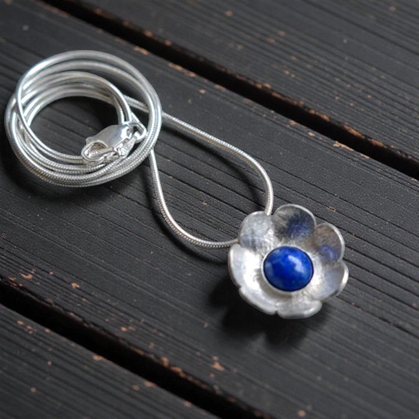 Artisan lapis lazuli flower sterling silver pendant necklace.