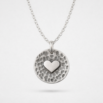 Sterling silver heart disc pendant