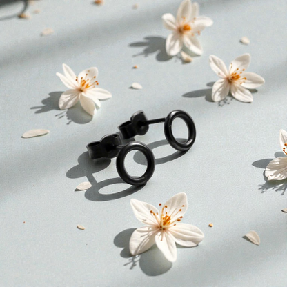 Oxidised sterling silver circle stud earrings.