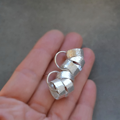 Sterling silver circle stud earrings.