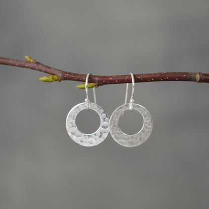 Hammered circle sterling silver earrings.