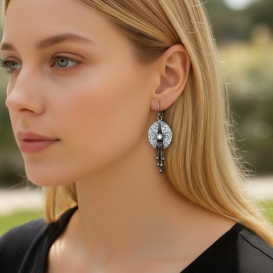 Mother of pearl oxidised sterling silver earrings.