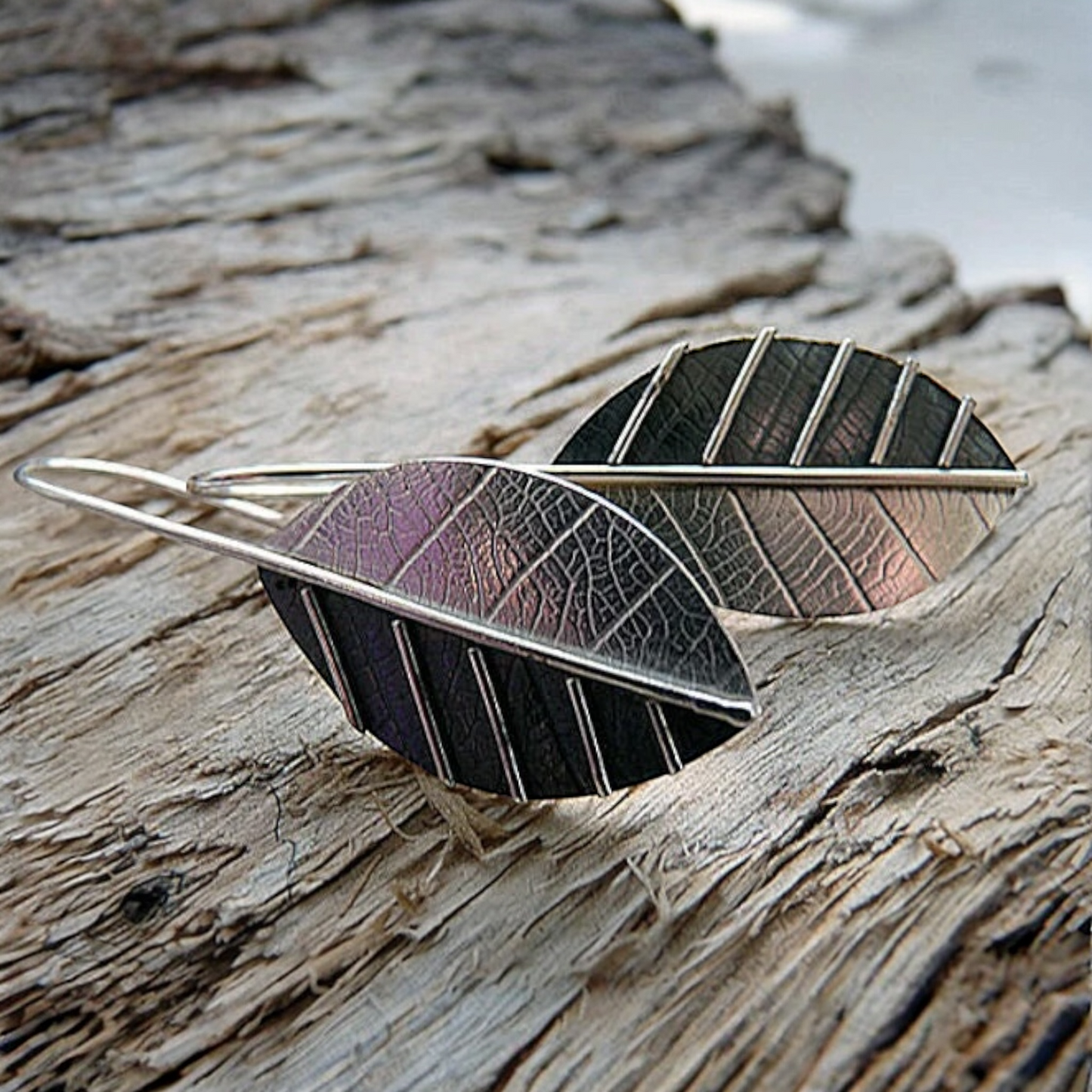 Sterling silver leaf earrings.
