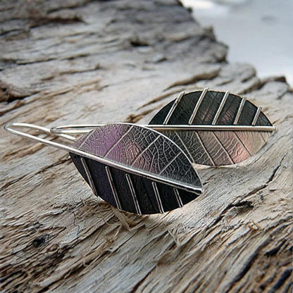Sterling silver leaf earrings.