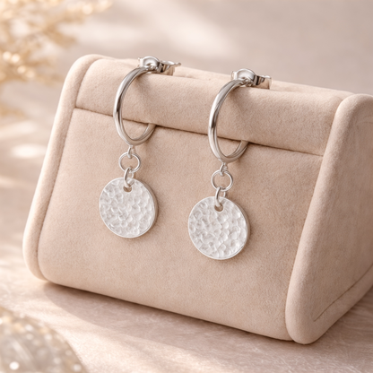 Sterling silver disc charm half hoop earrings.