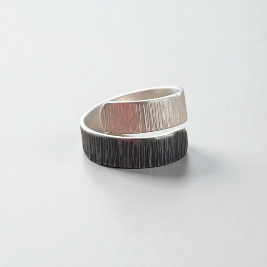 Sterling silver partially oxidised adjustable wrap ring.