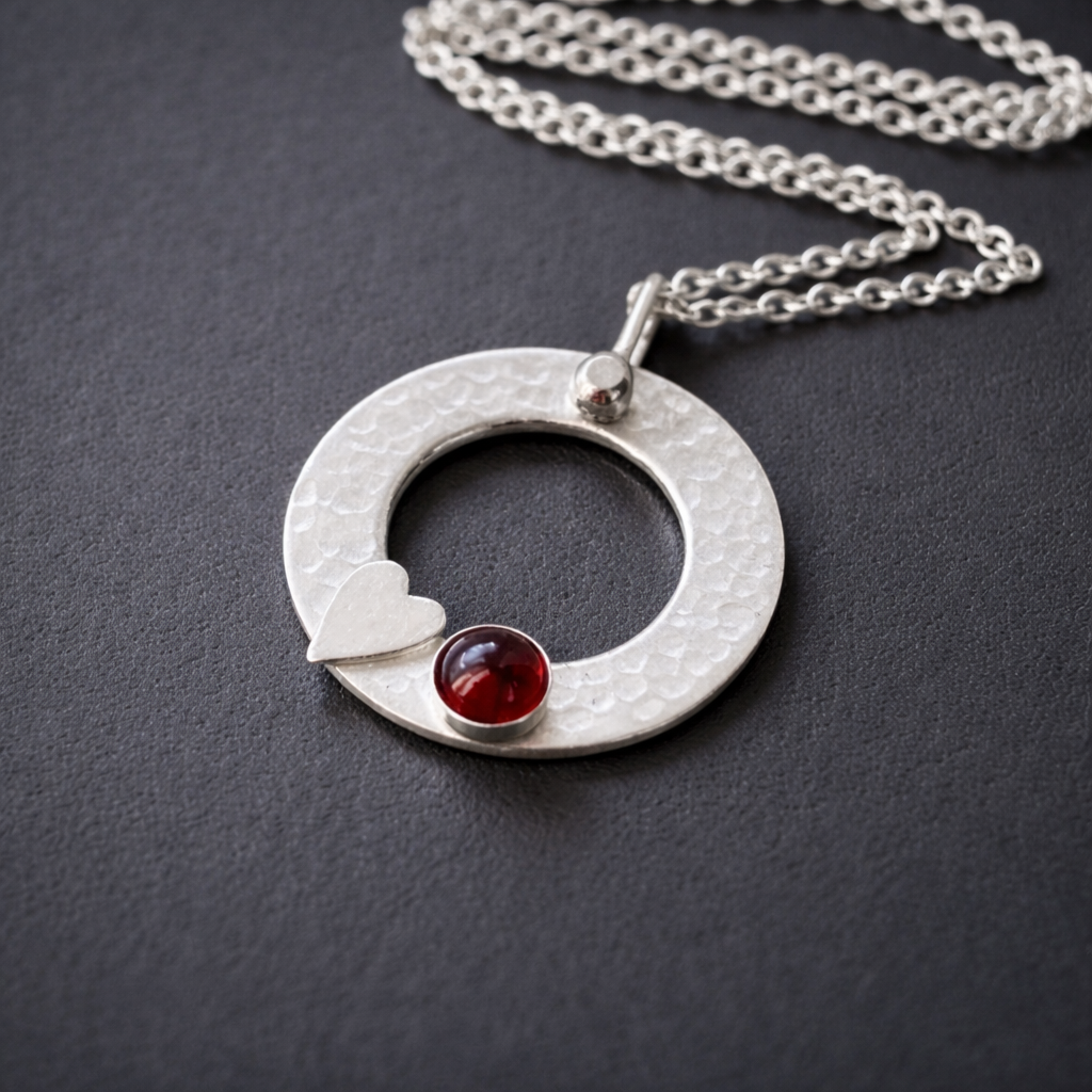 Sterling silver garnet circle necklace