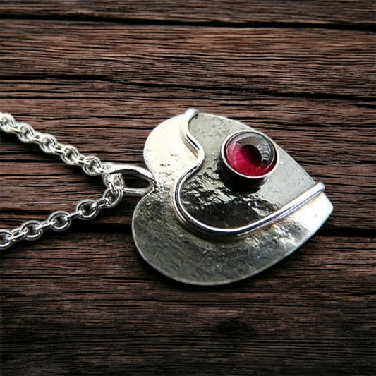 Garnet heart sterling silver necklace.
