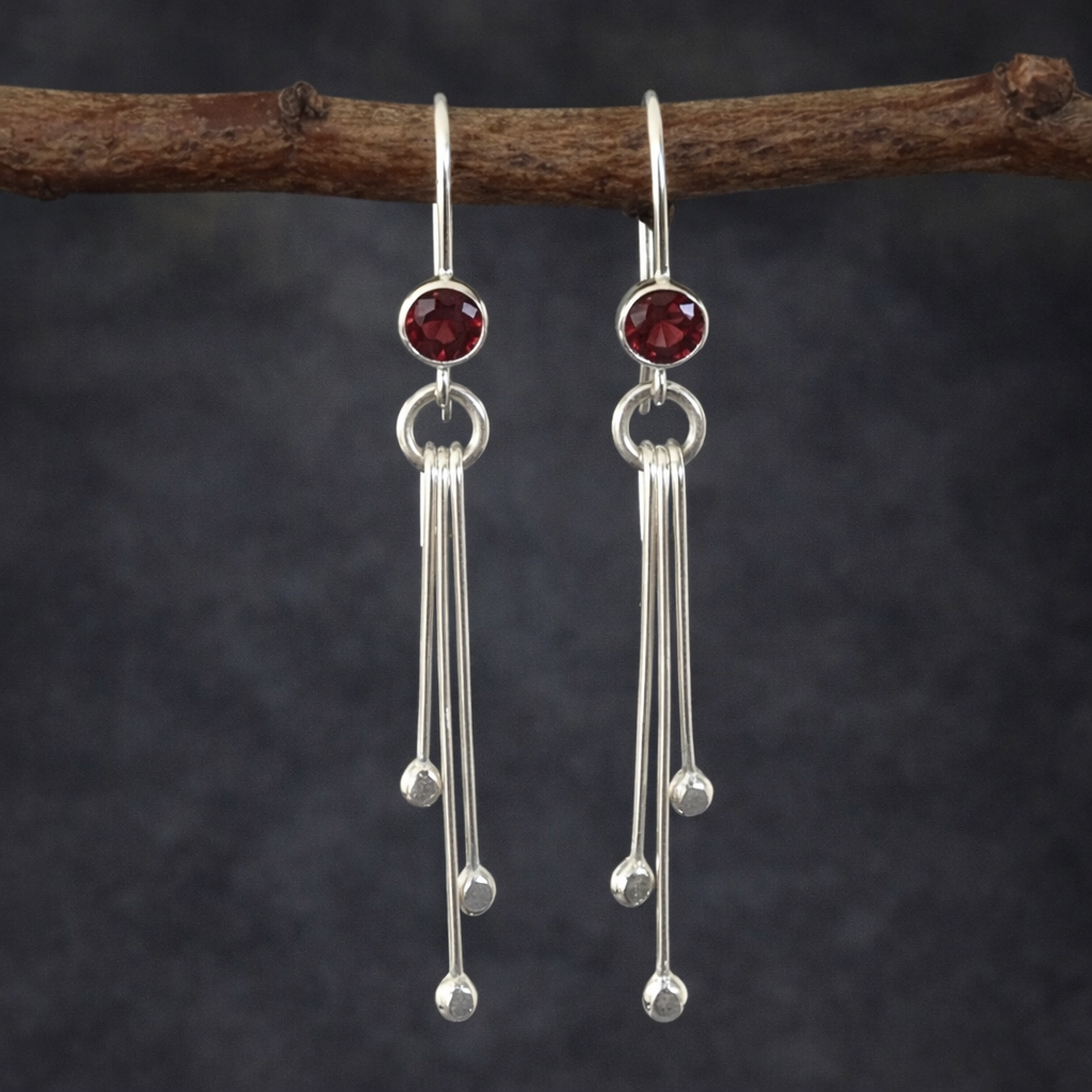 Garnet sterling silver dangle earrings.