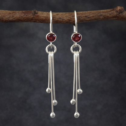 Garnet sterling silver dangle earrings.