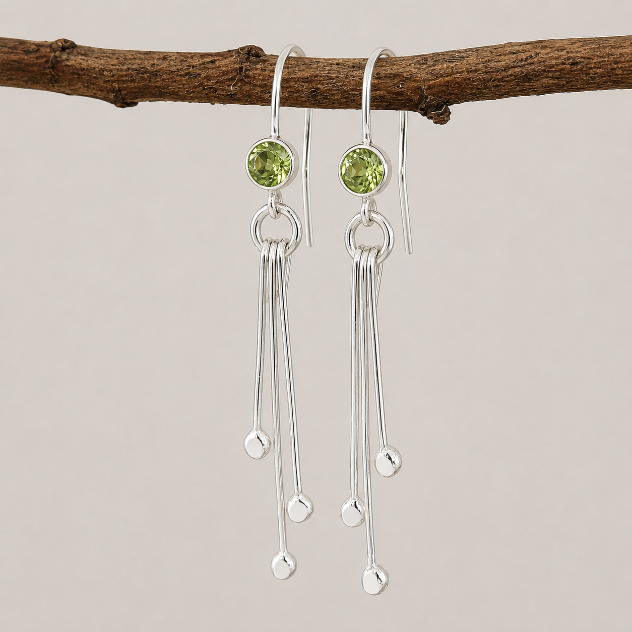 Peridot birthstone sterling silver dangle earrings.
