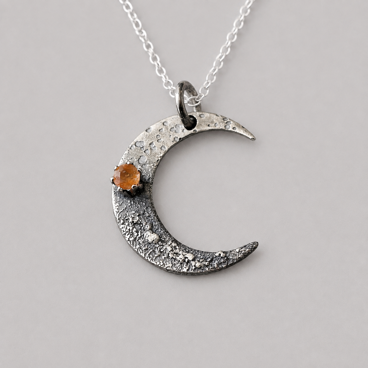 Sunstone crescent moon oxidised sterling silver necklace