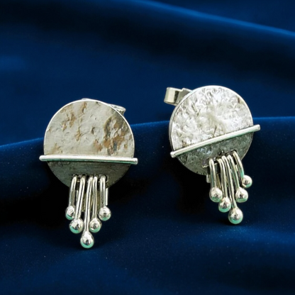 Dangle sterling silver disc stud earrings.