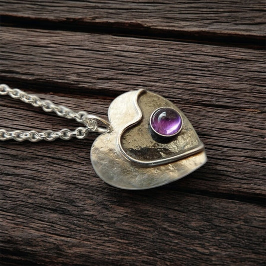 Amethyst sterling silver heart necklace.