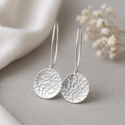 Sterling silver hammered disc earrings