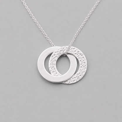 Sterling silver interlocking circle necklace.