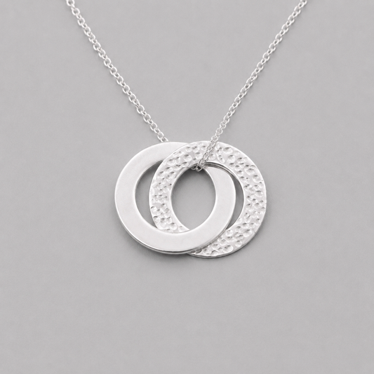 Sterling silver interlocking circle necklace.