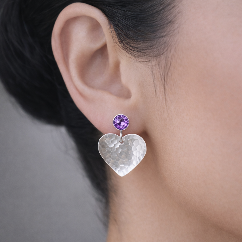 Amethyst February birthstone sterling silver heart stud earrings.