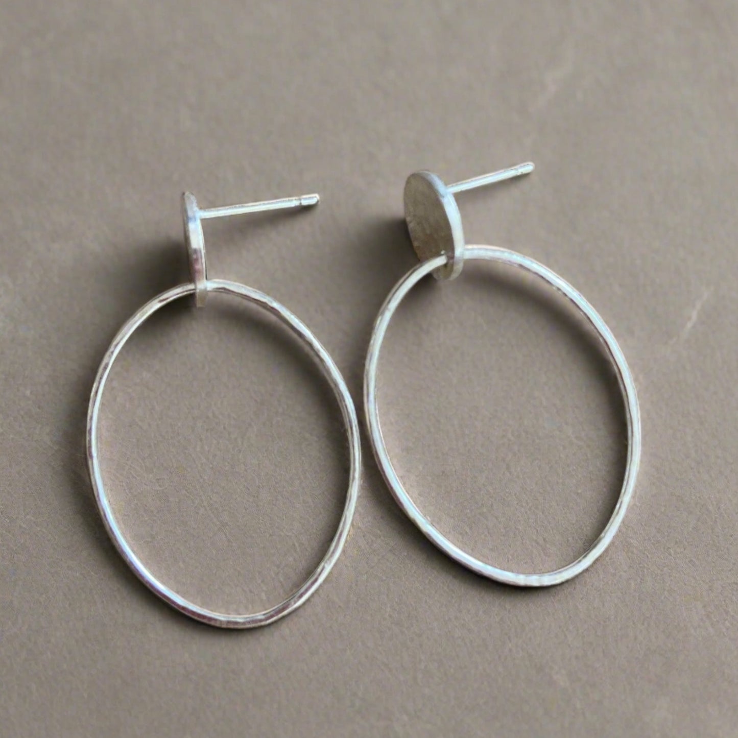 Sterling silver hammered disc and oval stud earrings