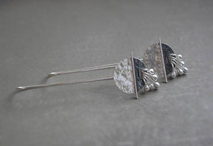 Long  sterling silver drop earrings.