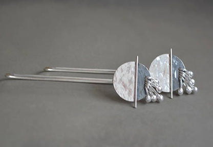 Long  sterling silver drop earrings.