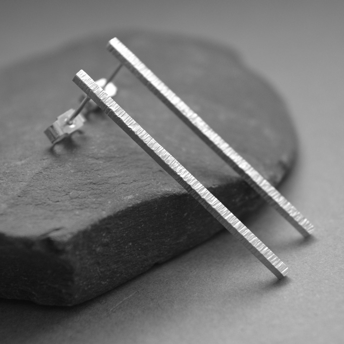 Oxidised sterling silver bar stud earrings.