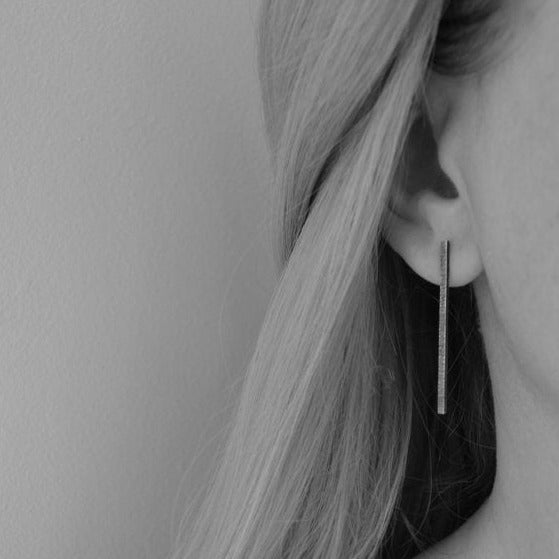 Oxidised sterling silver bar stud earrings.