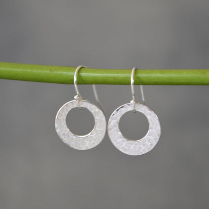 Hammered circle sterling silver earrings.