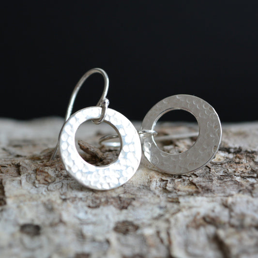 Hammered circle sterling silver earrings.