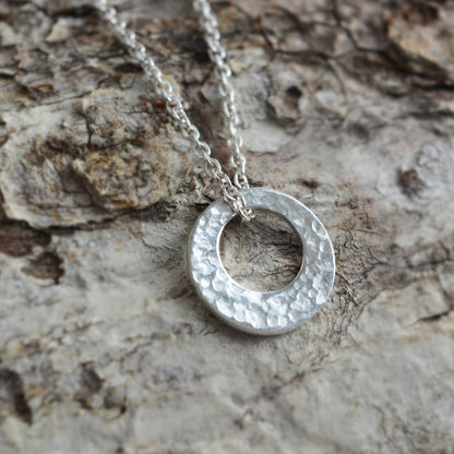 Small minimalist hammered sterling silver necklace.