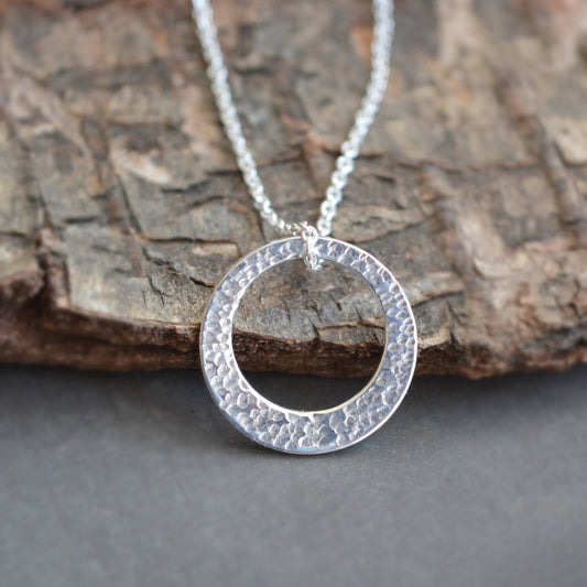 Minimalist hammered sterling silver washer necklace.
