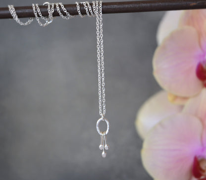 Small sterling silver oval pendant.
