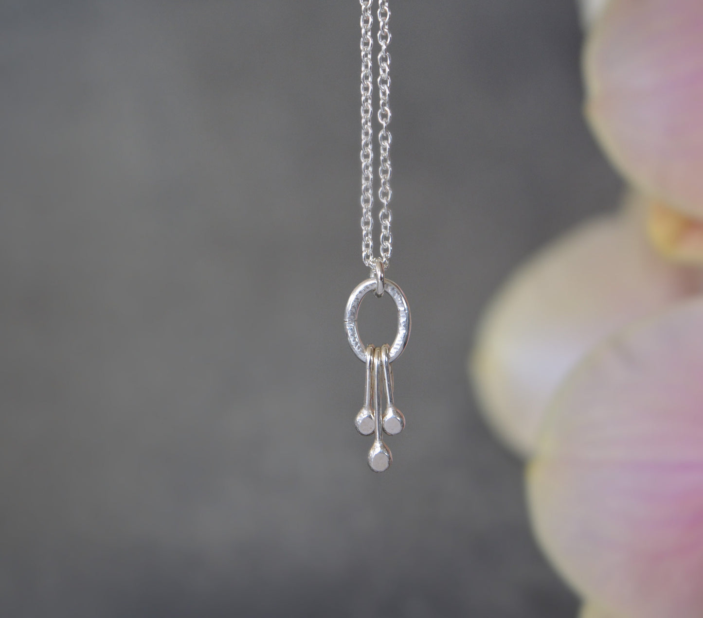 Small sterling silver oval pendant.